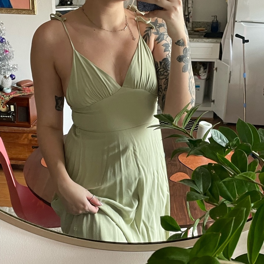 green plunge neckline midi dress